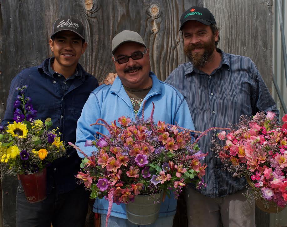 Julio, Carlos and Ben with their market bouquets photo by Lindsey Mizock